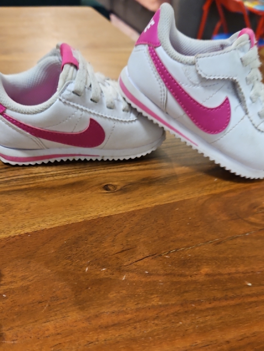 Nike Kids White Sneakers with Pink Swoosh